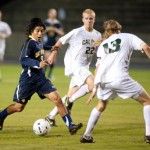 SCOTT ROEDER | Staff PhotographerSenior Irving Garcia weaves his way through the Mustang defense. He leads the team with seven goals.