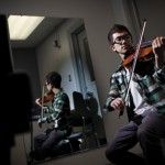 BRANDON WONG | Staff PhotographerNext year, music major Andy Chen’s private violin lessons will go from free to $450 per quarter.