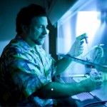 BRANDON WONG | Staff PhotographerBruce Blumberg examines cow serum tested for additives in order to figure out which type best supports the growth of fat cells.