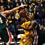 NICHOLAS VU | Staff PhotographerSenior Michael Hunter is smothered by the La Verne defense, but UCI would go on to win their home opener, destroying the Leopards 82-54.