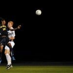 RASHMI GUTTAL | Photography InternUCI junior Amani Walker jumps up to try and head the ball against a rather pesky UCSB defender.